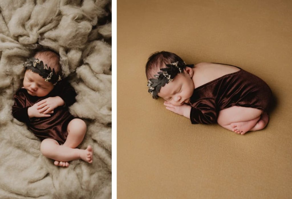 Baby girl sleeping on textured fur, wearing brown velvet romper and black floral headband